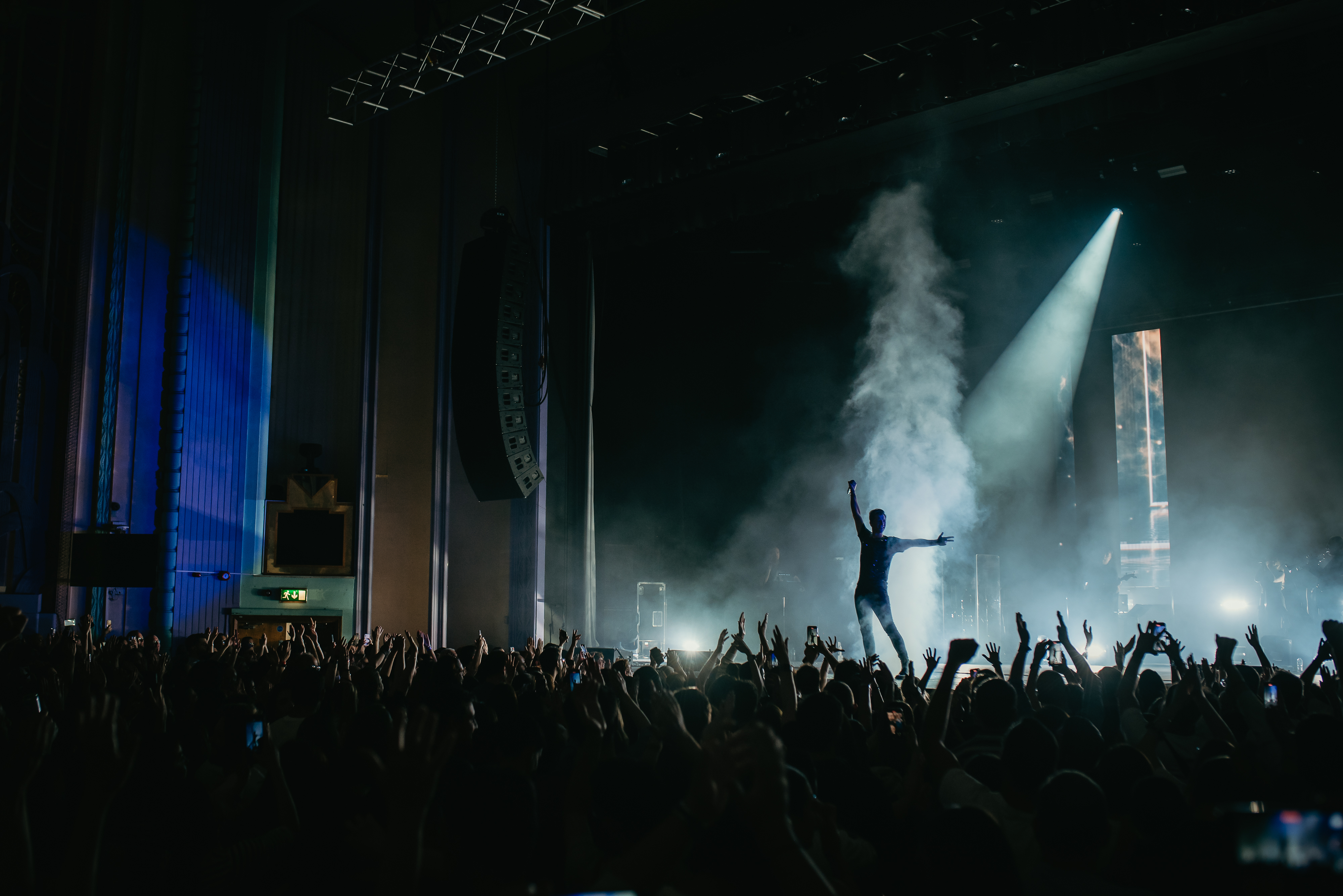 Sakis Rouvas performing at Troxy, with fans gathered around the stage
